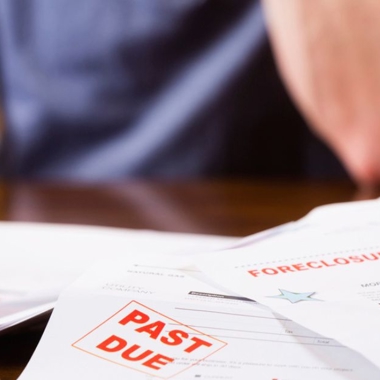 Man dealing with foreclosure and other debts